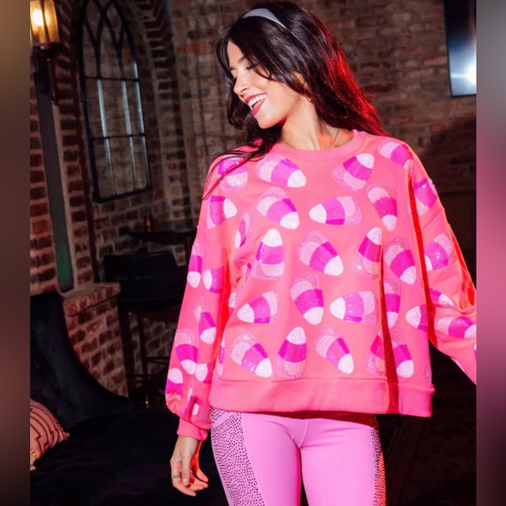 New unworn Queen of Sparkles Neon Pink
Candy Corn Sweatshirt size medium!